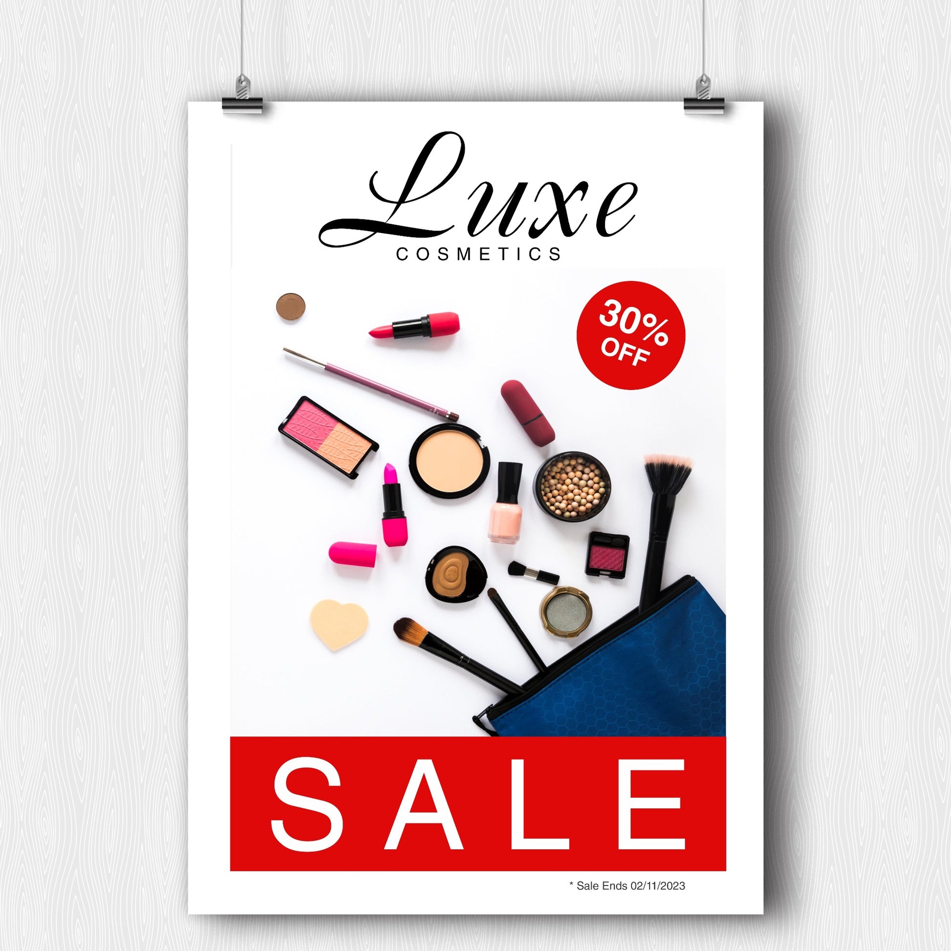 A photograph of a glossy advertising poster advertising a cosmetics sale